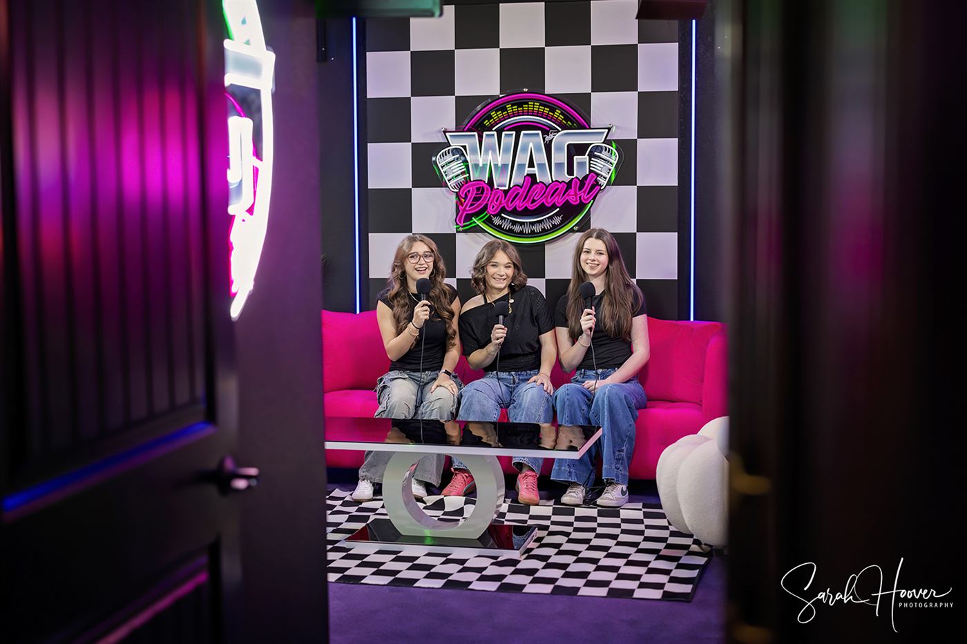Angelina, Scarlett, and Annabella with microphones on the WAG Podcast set